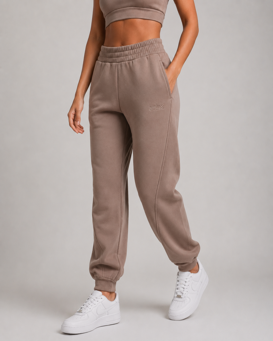 URBX Heavyweight High-Waist Joggers Taupe - Front angle view hand on thigh