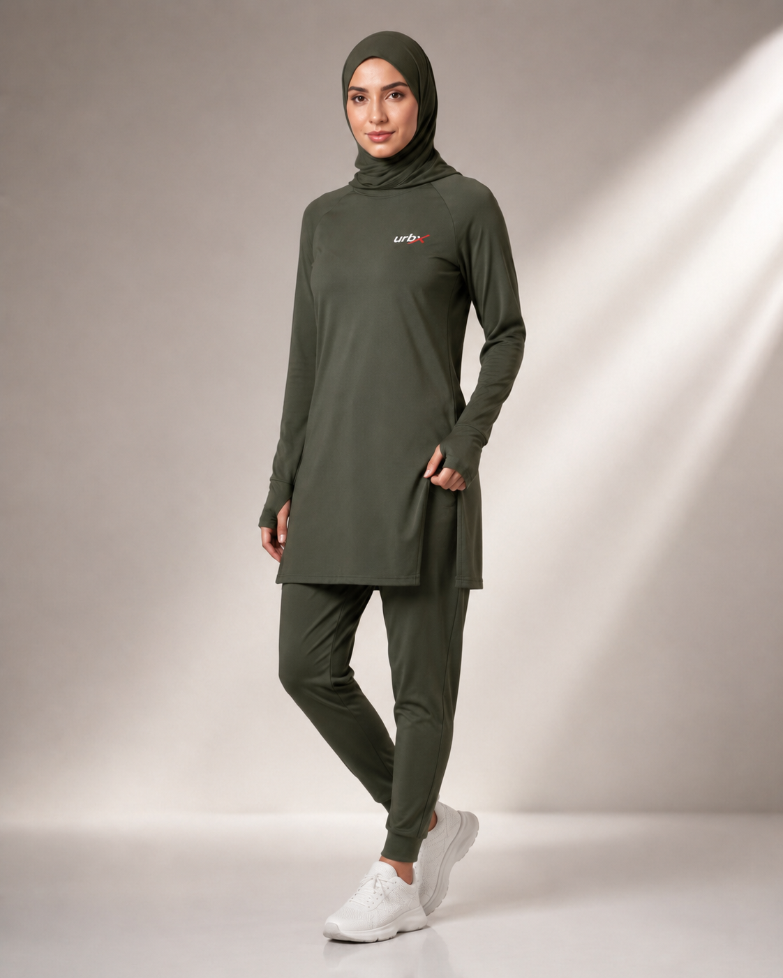 URBX Modest Active Set Olive Green - Front angle lifestyle view with hand in pocket