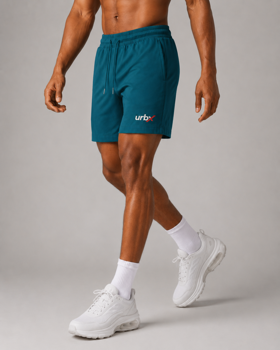 URBX Training Shorts Teal – Kneeling action shot