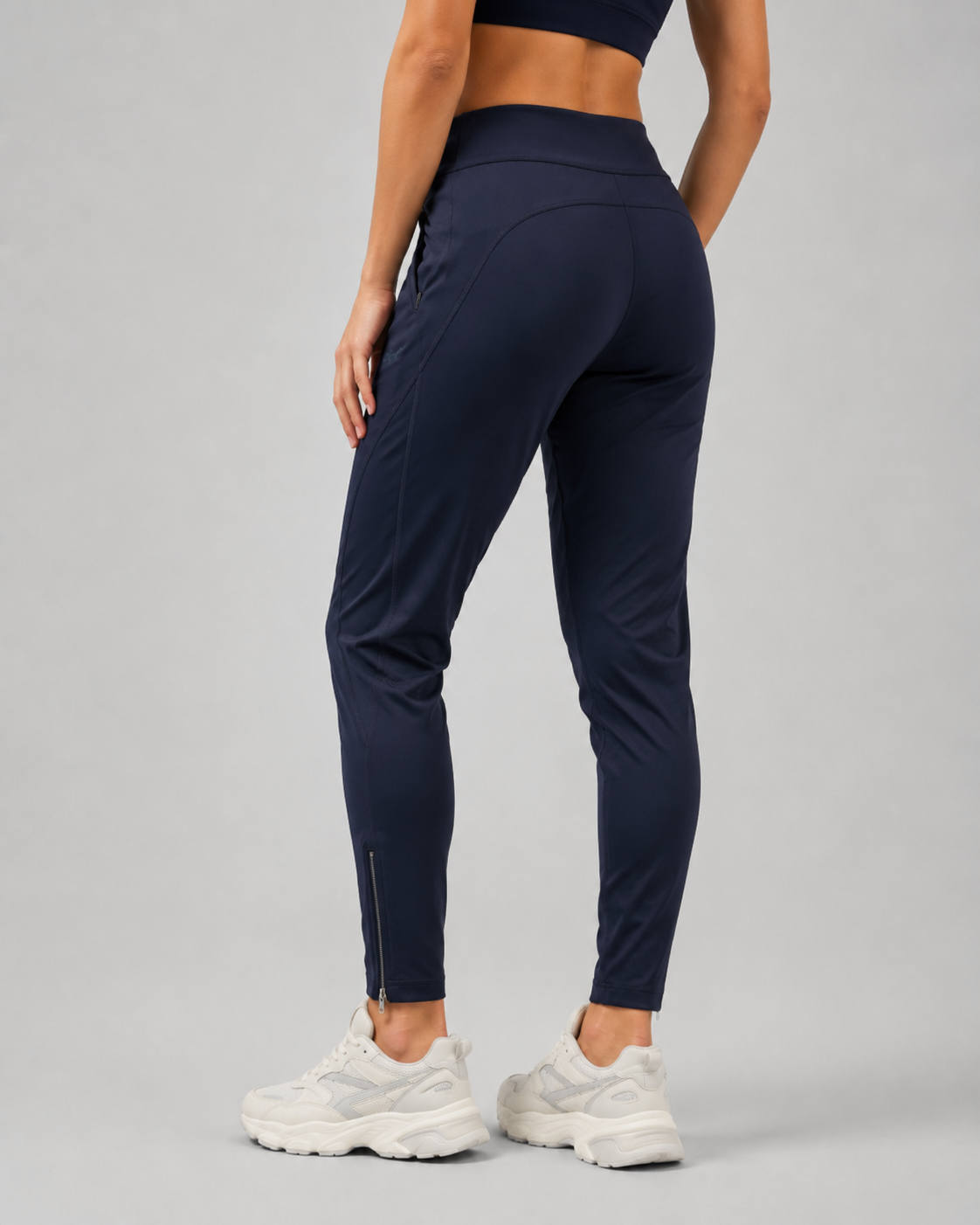 URBX Woven High-Waist Training Pants Navy - Back view showing ankle zip detail