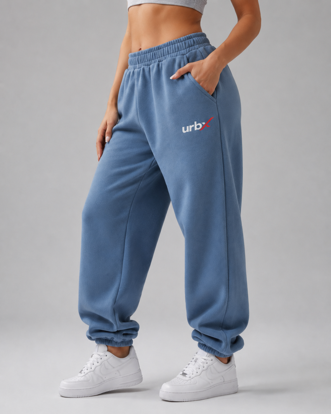 URBX Oversized Fleece Joggers Steel Blue - Front angle logo close up